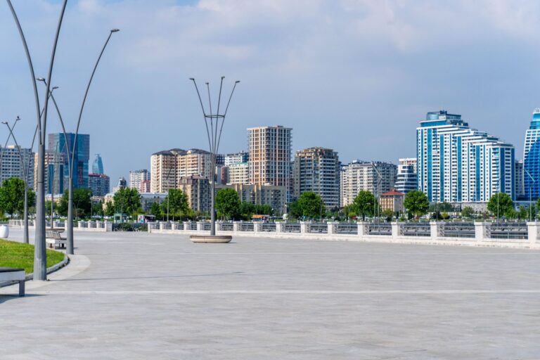 Captivating view of Baku's urban skyline with modern architecture under a clear blue sky.
